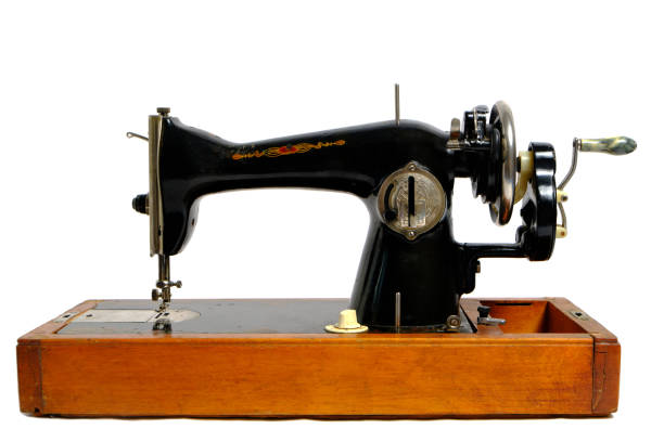 istock Old, retro vintage sewing machine on a white background. 1321298048