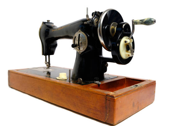 istock Old, retro vintage sewing machine on a white background. 1321298049