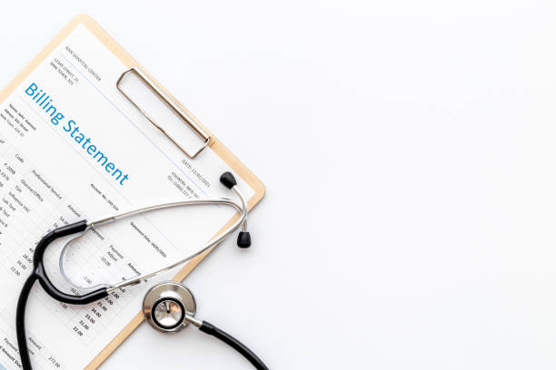 istock Medical billing statement with stethoscope. Top view 1321300696