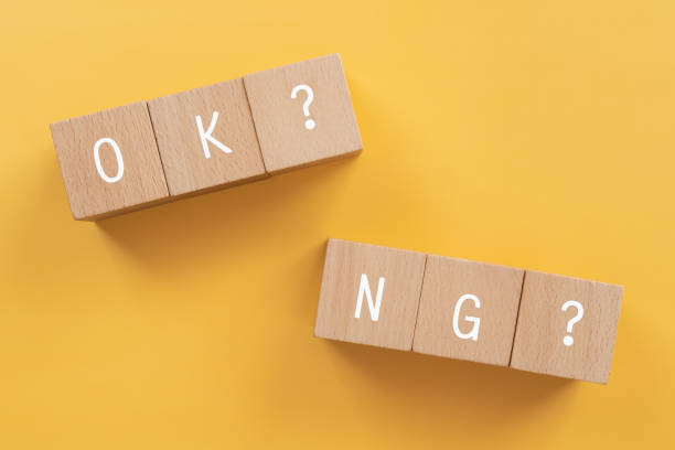 OK or NG; Wooden blocks with "OK? NG?"  text of concept. OK or NG; Wooden blocks with "OK? NG?"  text of concept. ok sign photos stock pictures, royalty-free photos & images