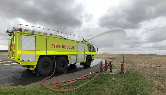 A Fire and Rescue Vehicle Parked in a Field.