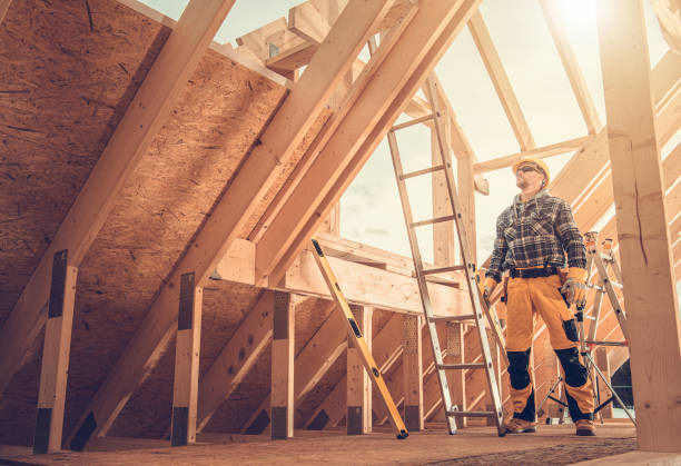istock Professional Construction Worker Inside Newly Built Wooden Frame House 1321308018
