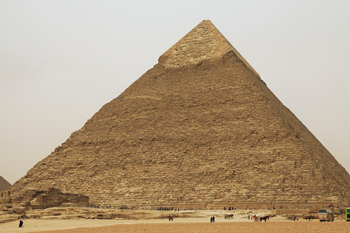 View of Pyramid of Khafre with tourists, Giza Pyramid Complex, Giza, Cairo, Egypt.