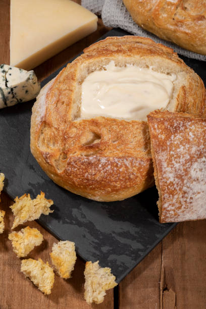 istock Cream cheese inside Italian bread with croutons, fondue. 1321308353