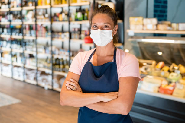 istock Confident employee in store during COVID-19 crisis 1321311462