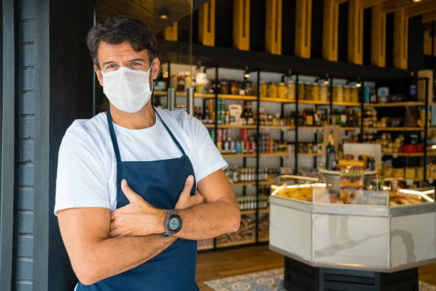 istock Confident owner at store during COVID-19 crisis 1321311492