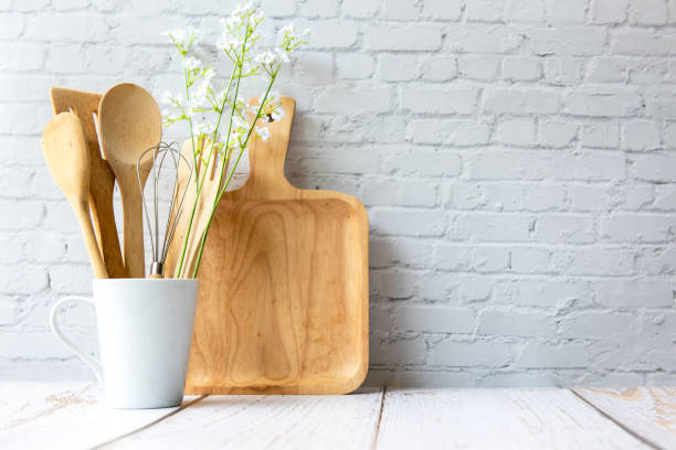 istock Kitchen tools and kitchenware utensil object on kitchen shelf wood white for healthy eat and health care life.  Wall white brick background, copy space for text 1321314014