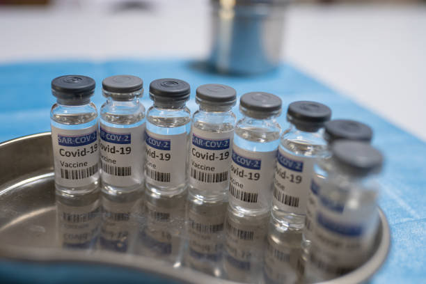 istock Covid-19 coronavirus vaccine vials in a row 1321314364
