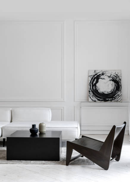 Leather sofa in hotel room with abstract picture