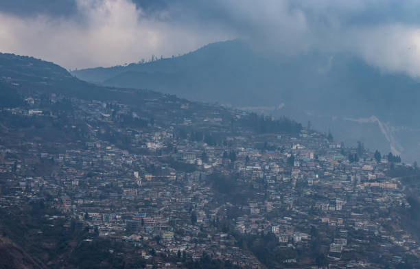 istock city urbanization view from hilltop with huge construction at day from flat angle 1321317029