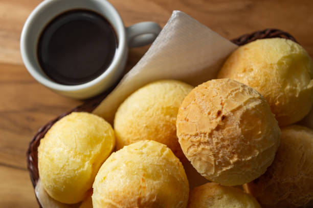 istock Cup of coffee and cheese buns. 1321320530