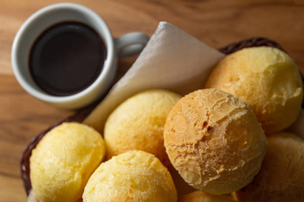 istock Cup of coffee and cheese buns. 1321320535