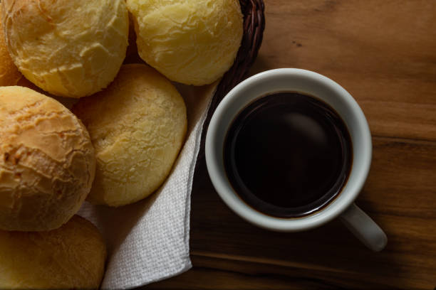 istock Cup of coffee and cheese buns. 1321320549