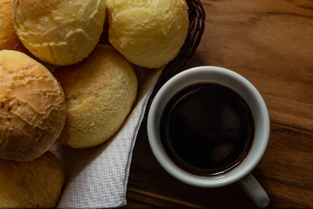 istock Cup of coffee and cheese buns. 1321320558