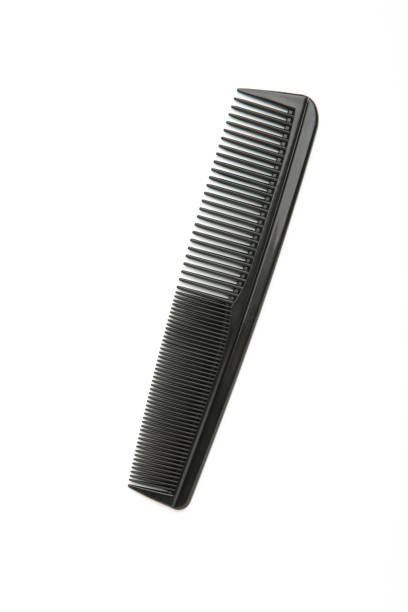 istock Black comb isolated on white background. Top view 1321320798