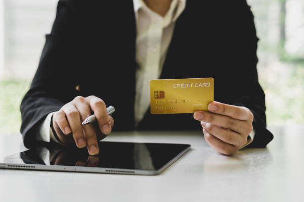 istock Woman shopping using tablet pc and credit card 1321322072