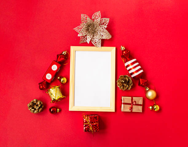 Flat composition with a Christmas tree made of different festive items, snowflakes, gifts, sweets, Christmas tree decorations on a red background. mockup. Copy space. Flat composition with a Christmas tree made of different festive items, snowflakes, gifts, sweets, Christmas tree decorations on a red background. mockup. Copy space n11 stock pictures, royalty-free photos & images