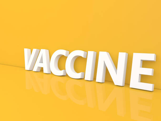 istock Vaccine inscription on a yellow background. 1321323637
