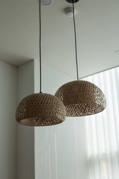 istock Decorating hanging lantern lamps in wooden wicker made from bamboo. 1321324998