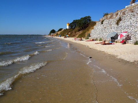 People enjoy the last days of holidays in sandy beach of De Haan, Belgium on September 17, 2023.