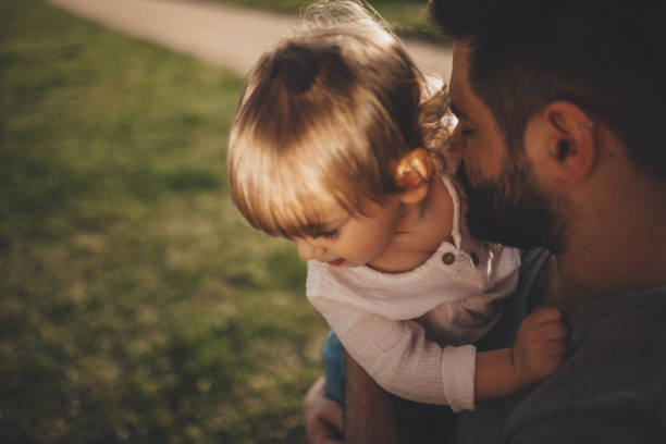 istock A loving father hugs his child carefully. 1321331290