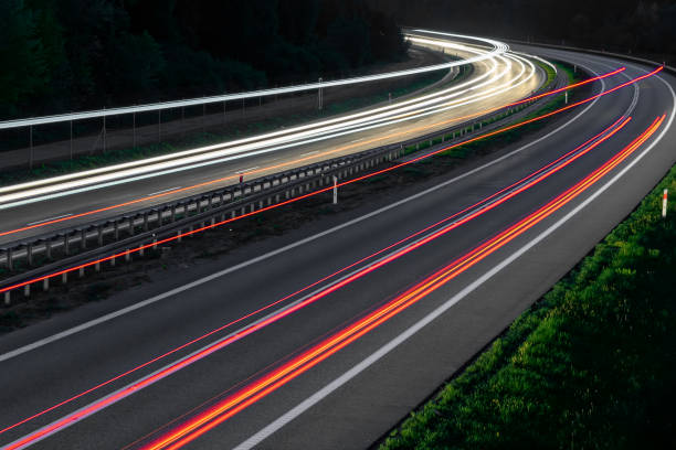 istock abstract red car lights at night. long exposure 1321332626