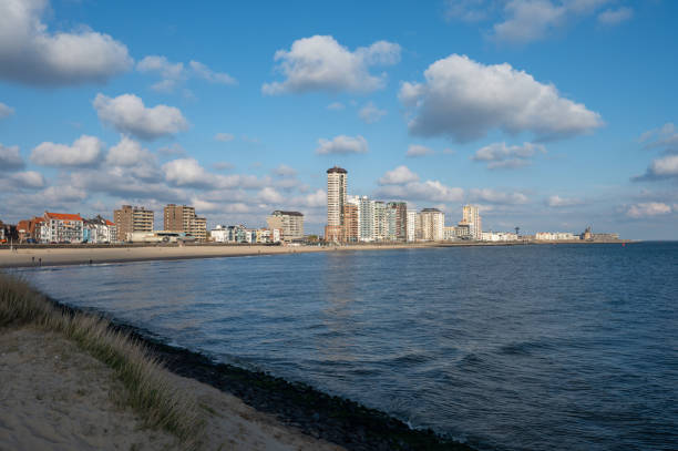 istock Waterfront, dunes and view on Vlissingen city with sandy beach on sunset 1321333071