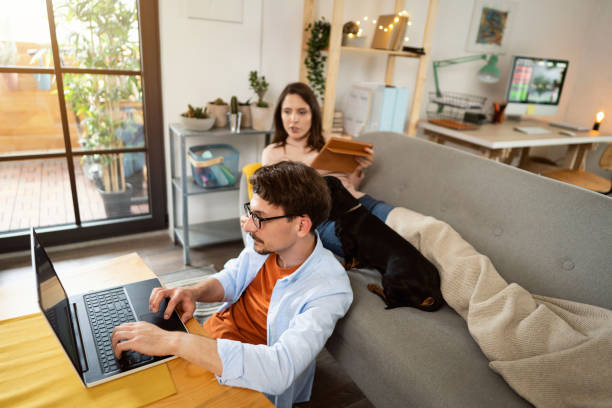 istock Young man and woman working at home 1321334169