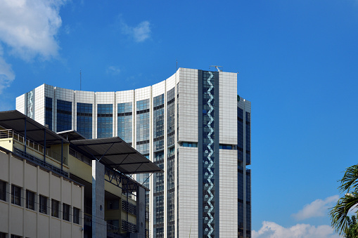 Abidjan, Ivory Coast / Côte d'Ivoire: African Development Bank / African Development Fund headquarters on Avenue Lamblin, Plateau district - multilateral development finance institution headquartered in Abidjan, the AfDB is a financial provider to African governments and private companies investing in the member countries, comprises three entities: the African Development Bank, the African Development Fund and the Nigeria Trust Fund.(Banque Africaine de Developpement / Fonds Africain de Developpement).