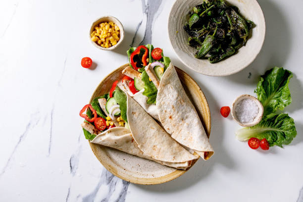 istock Traditional mexican tortila wrap with pork meat 1321342942
