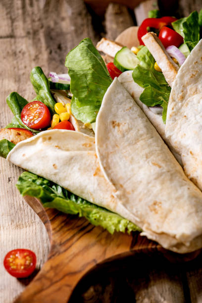 istock Traditional mexican tortila wrap with pork meat 1321342943