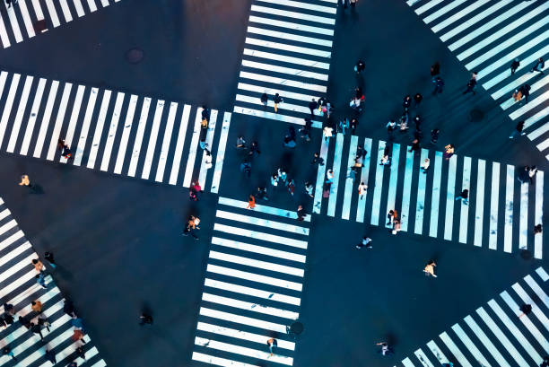 istock Traffic and people cross a busy intersection in Ginza 1321343078
