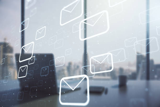 istock Creative abstract postal envelopes hologram and modern desktop with pc on background, email and notification concept. Multiexposure 1321343723