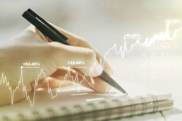 istock Multi exposure of abstract creative financial chart with hand writing in diary on background, research and analytics concept 1321343748