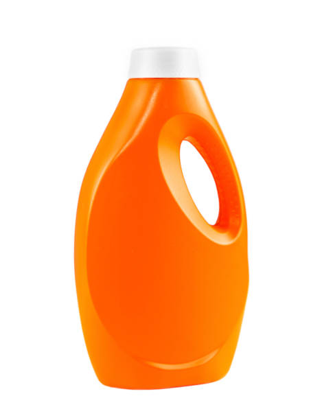 istock Plastic bottle orange close up isolated on white background. 1321344323