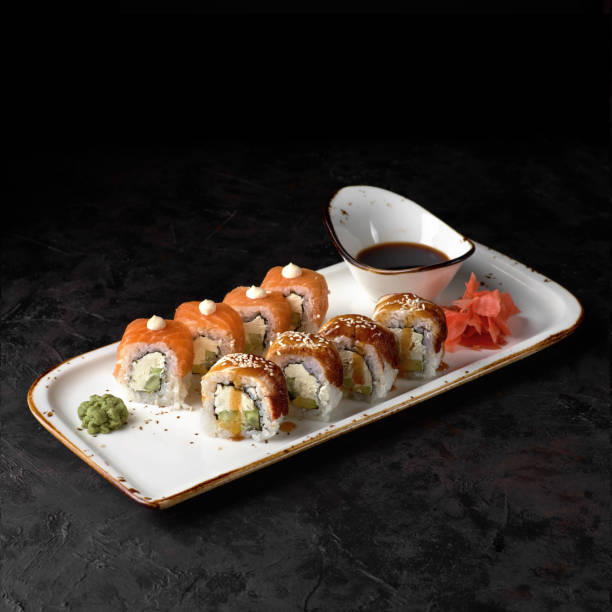 istock Beautiful Set, sushi roll Philadelphia and Canada on a plate 1321346335