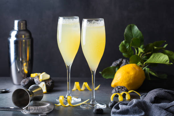 french 75 cocktail with lemon hard seltzer instead of champagne - hard drink imagens e fotografias de stock