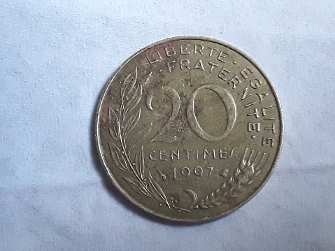 A coin of 20 cents French francs.
