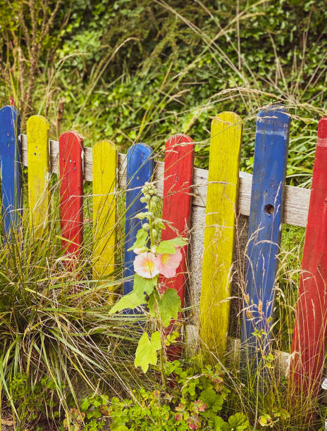 istock Cheerful garden fence in Pippi longstocking style 1321353670