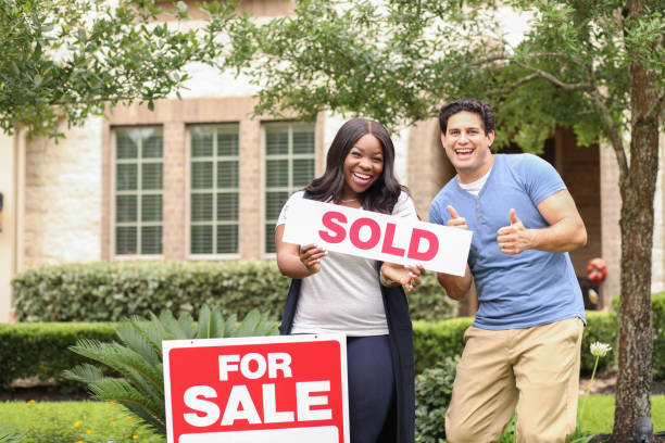 istock Excited young couple buys their first home. 1321354643