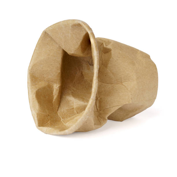 istock crumpled brown paper cup made from ecological materials isolated on white 1321357318