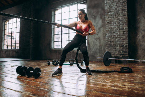 istock female bodybuilder training at the gym 1321357446