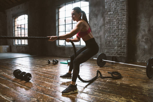istock female bodybuilder training at the gym 1321359566