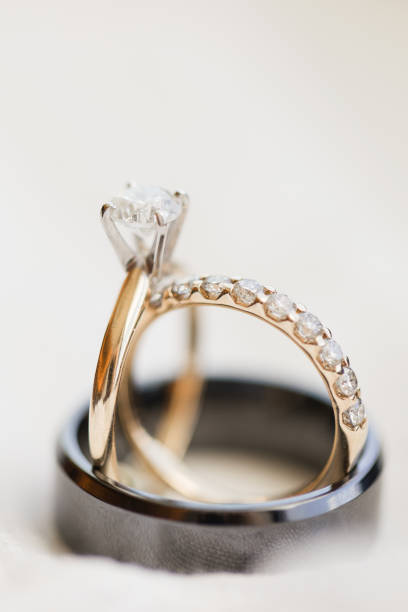 istock Diamond Wedding Rings in Bright Natural Light 1321359598