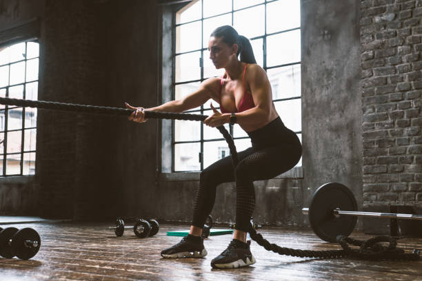 istock female bodybuilder training at the gym 1321359613