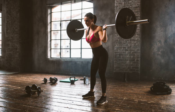 istock female bodybuilder training at the gym 1321359656