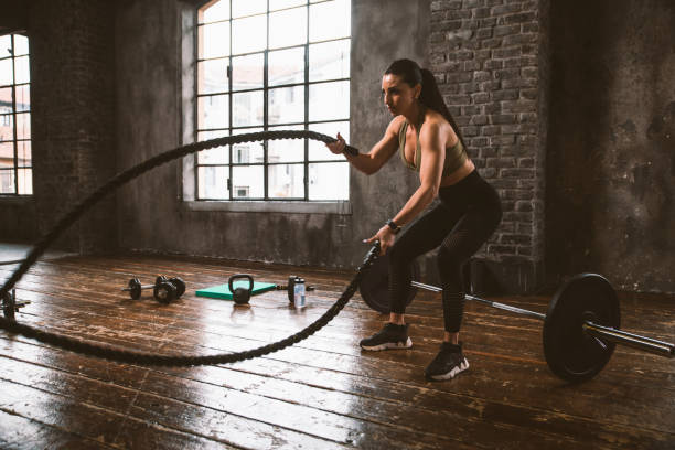 istock female bodybuilder training at the gym 1321359762
