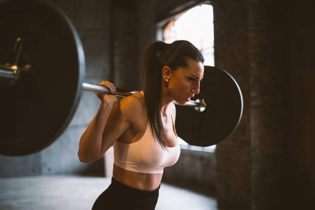 istock female bodybuilder training at the gym 1321359813