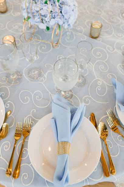 istock Classic Gold, Blue & White Wedding Decor & Table Place Settings 1321359825