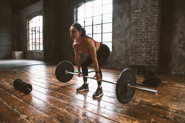istock female bodybuilder training at the gym 1321359867